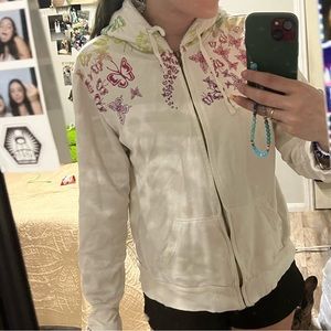 White with colorful butterfly jacket